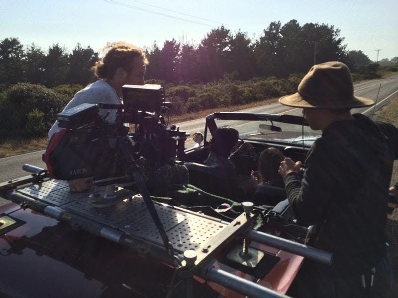 Commercial film production behind the scenes super 35mm film camera car rig dp ac amber 2015.jpg
